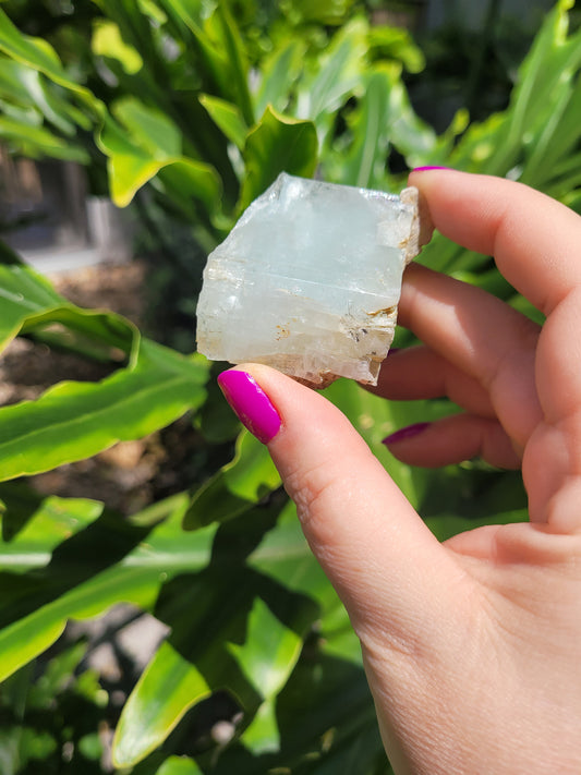 Raw Aquamarine with Golden-Toned Mineral Inclusions